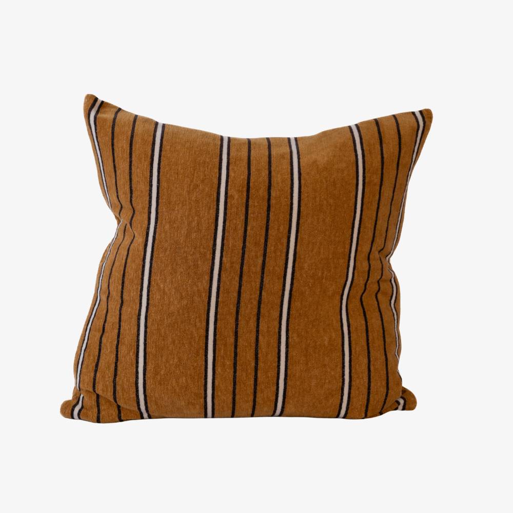 Striped brown pillow with black and white stripes on a white background