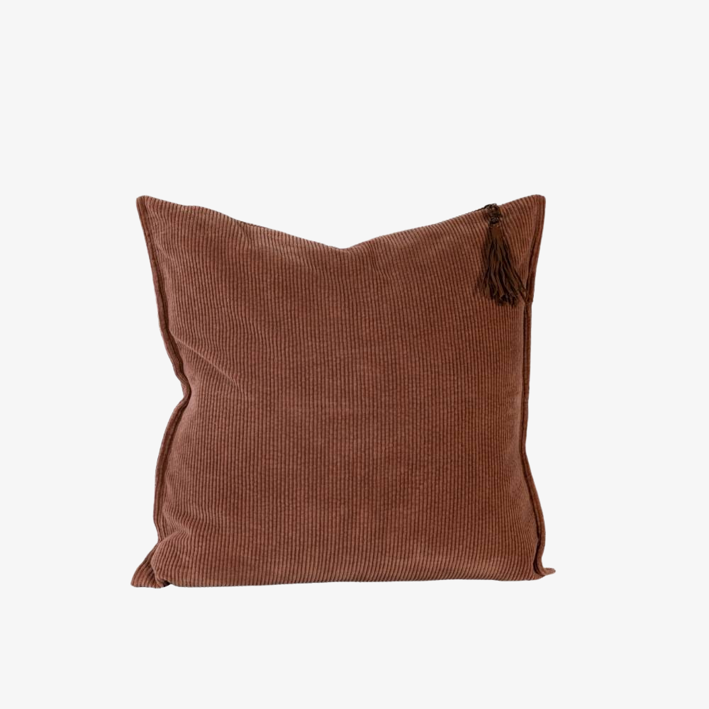Brown textured corduroy pillow with tassels