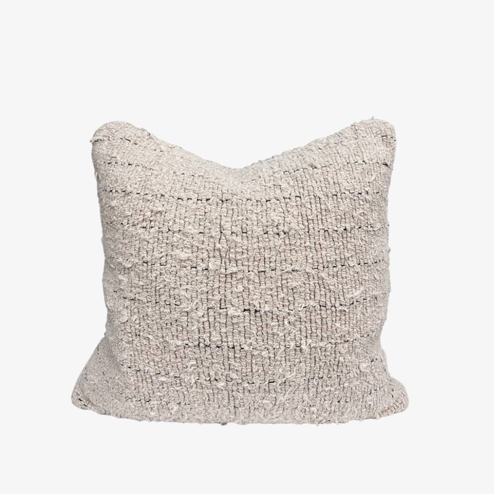 Textured linen cushion by Eadie Lifestyle on a white background