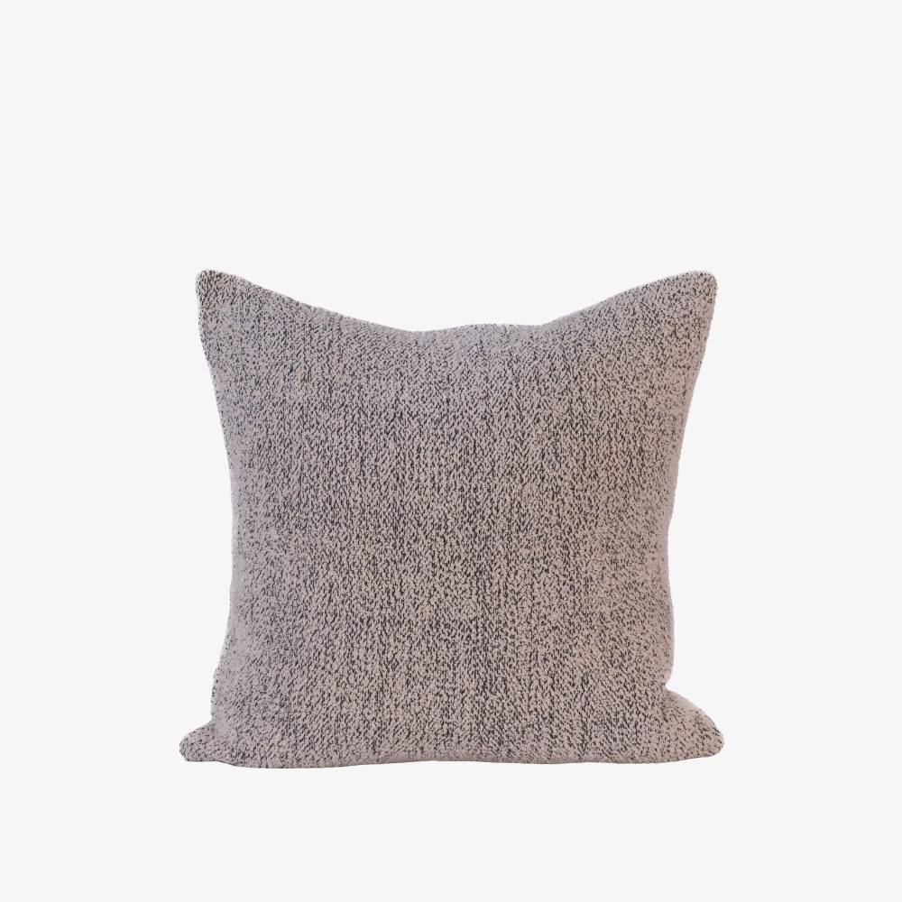 Textured gray pillow on a white background