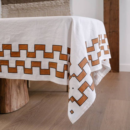 Tablecloth with geometric pattern on a wooden table