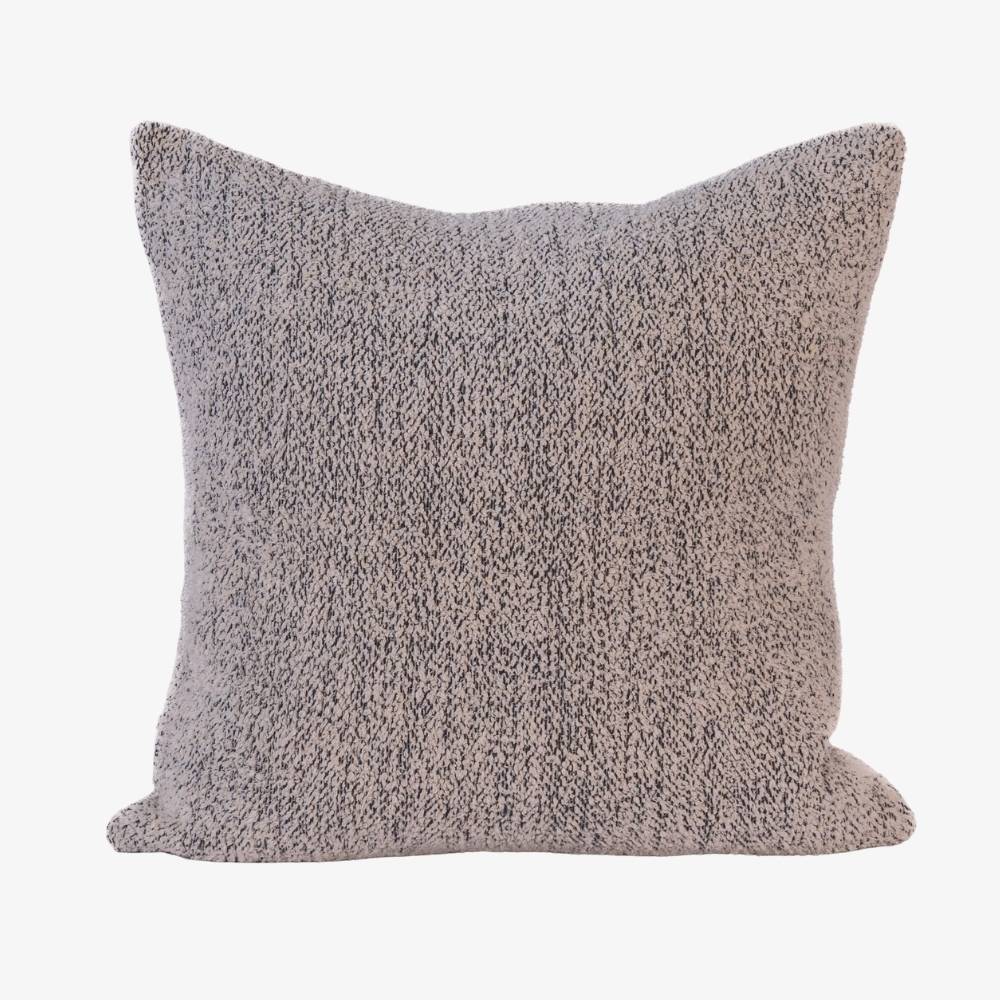 Textured gray pillow on a white background