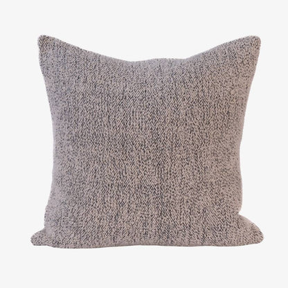 Textured gray pillow on a white background