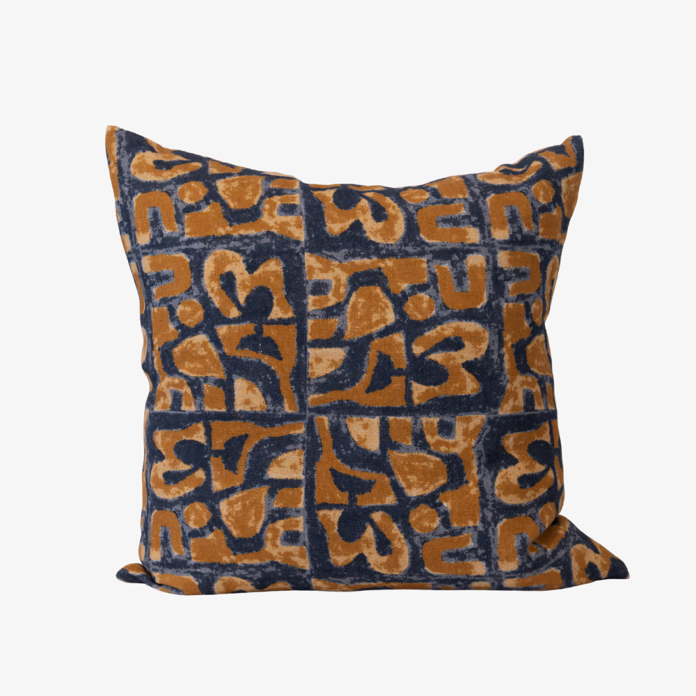 Decorative pillow with a geometric pattern on a white background