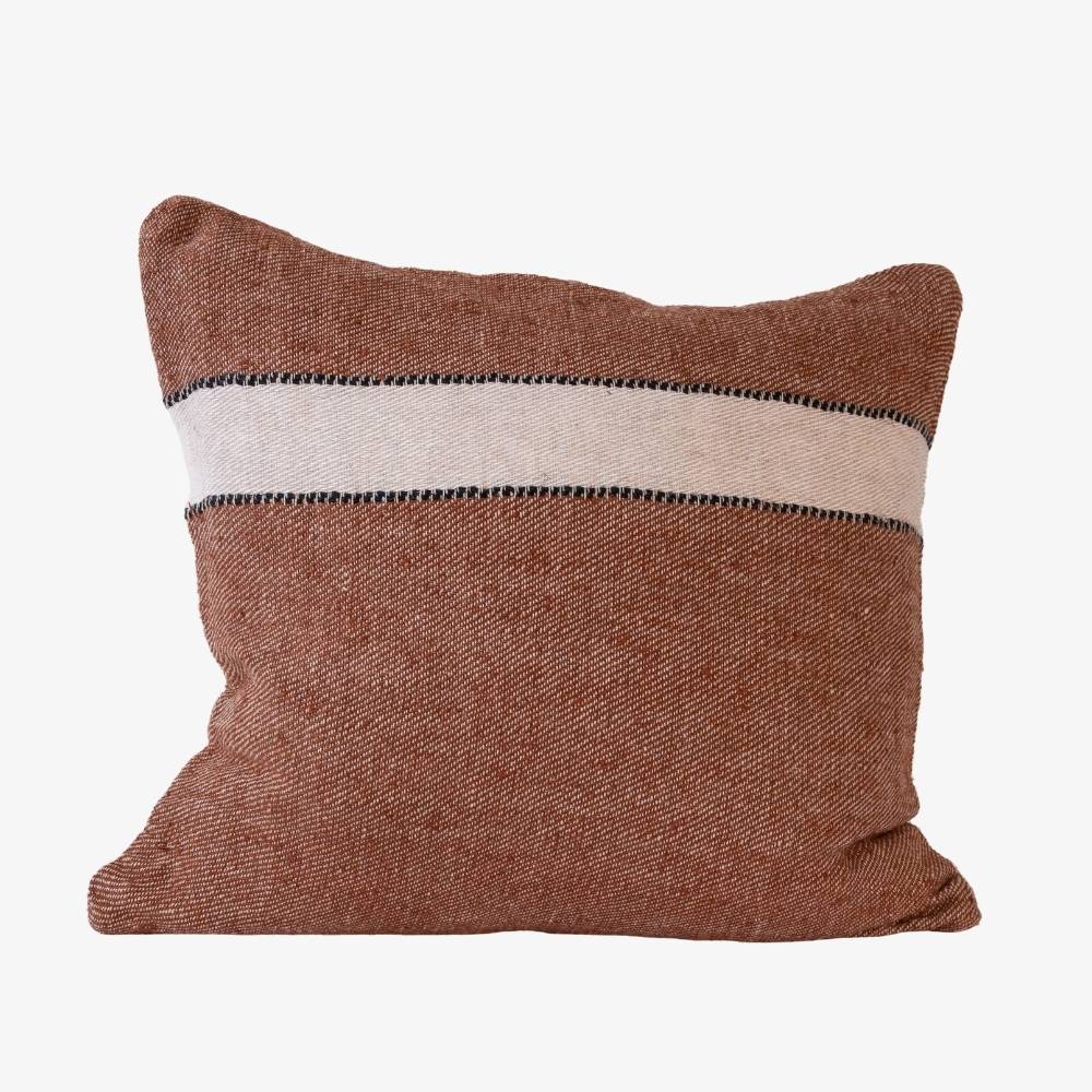 Brown pillow with a white stripe on a white background