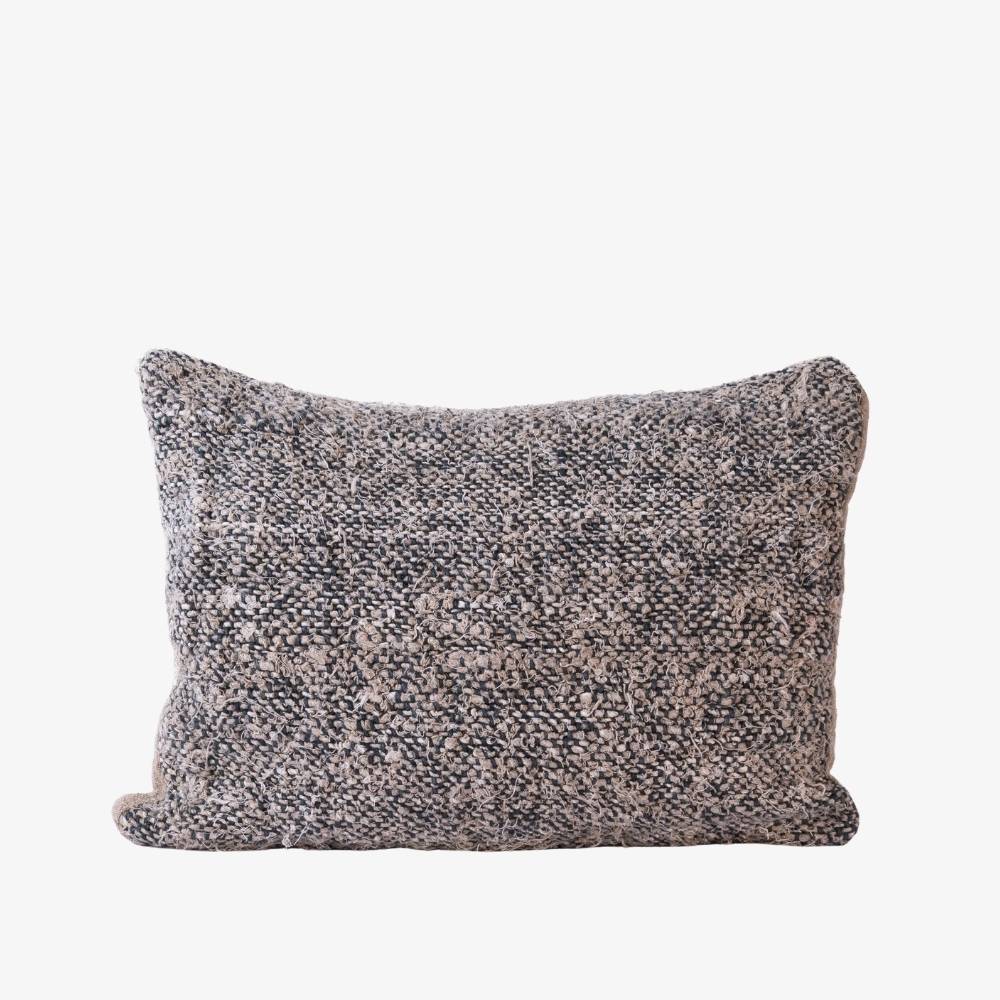 Textured rectangular pillow on a white background