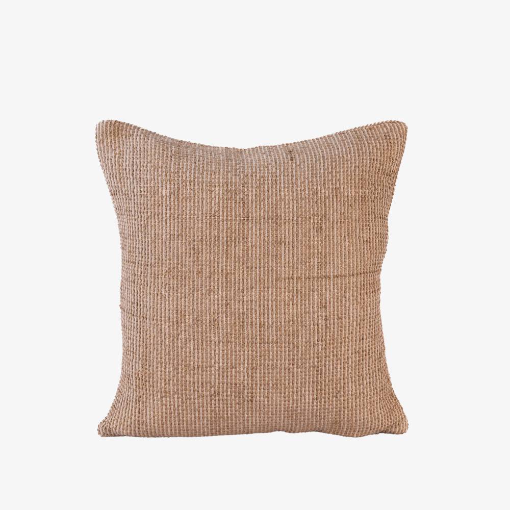 Textured brown pillow on a white background