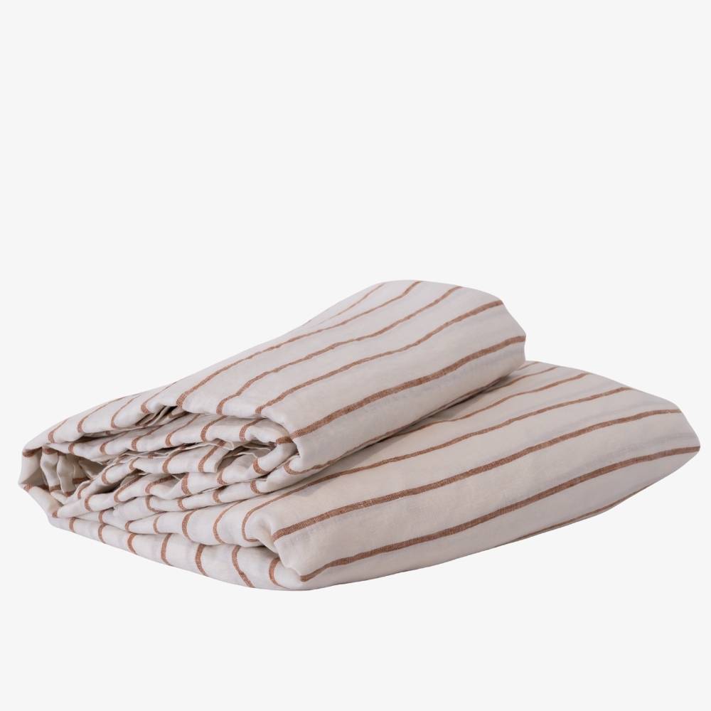 Folded striped fabric on a white background