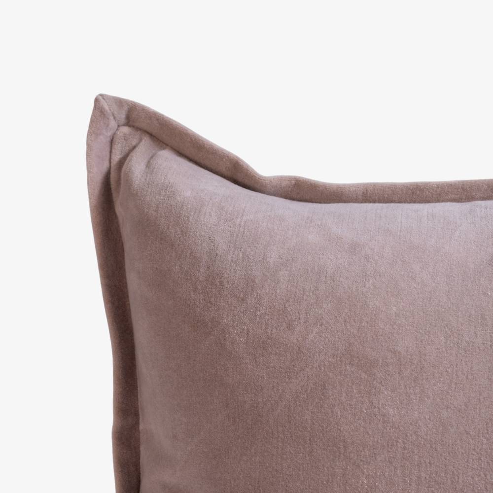 Close-up of a brown pillow on a white background