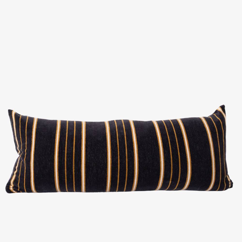 Black pillow with brown and white striped on a white background