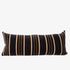Black pillow with brown and white striped on a white background