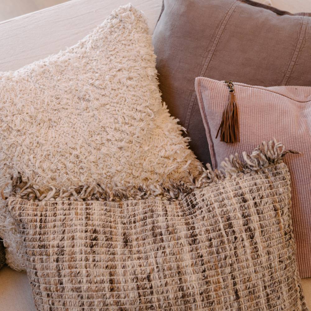 Decorative textured pillow on a sofa
