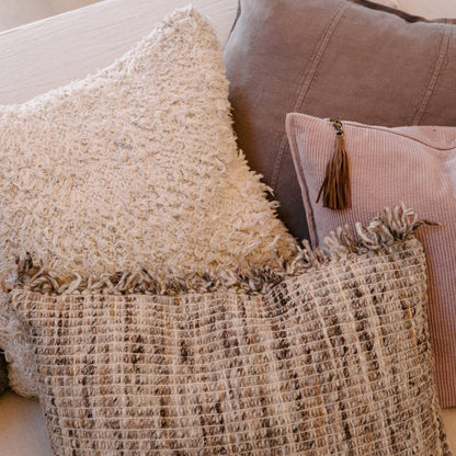 Decorative textured pillow on a sofa
