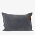 Gray cushion with a brown tassel on a white background