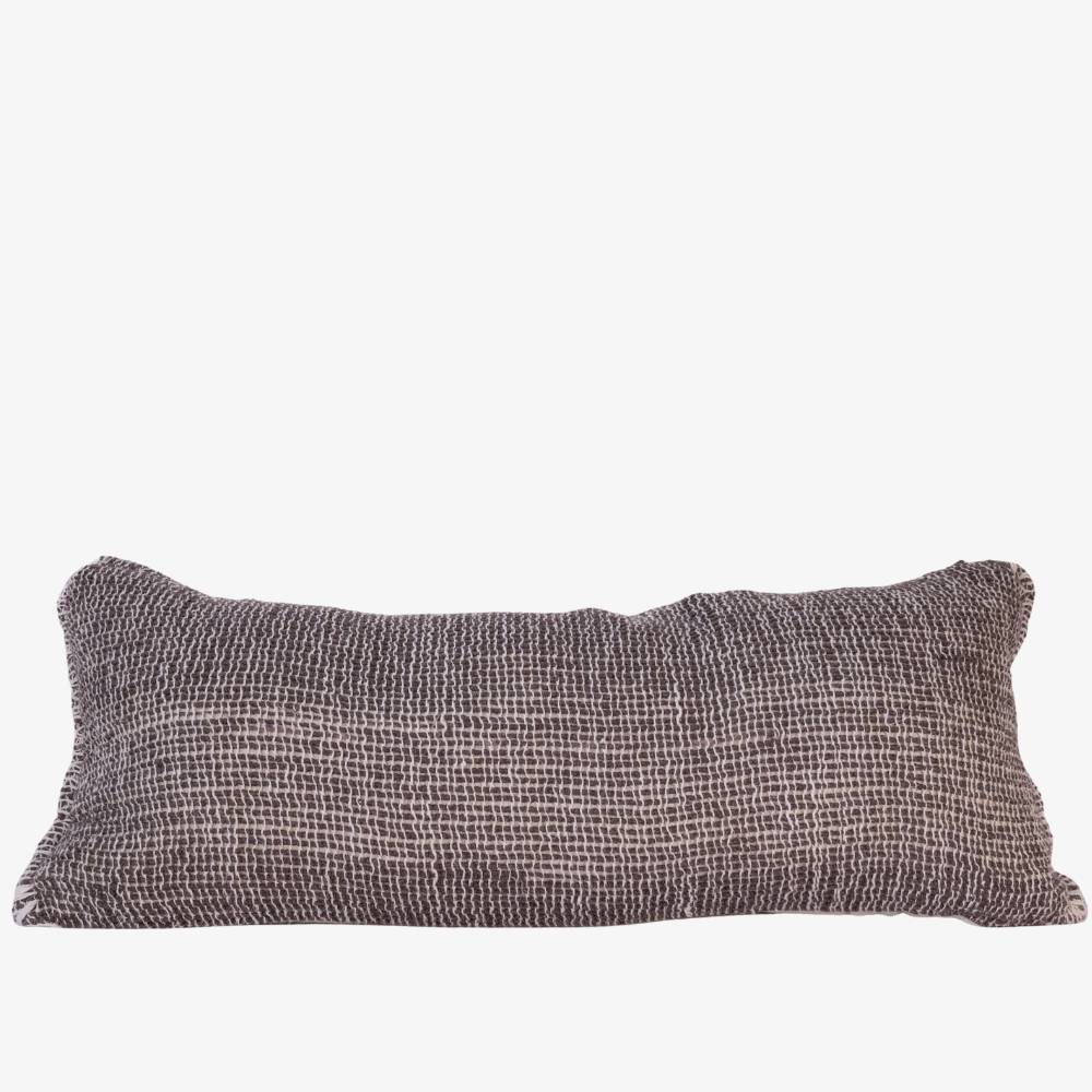 Textured rectangular pillow on a white background