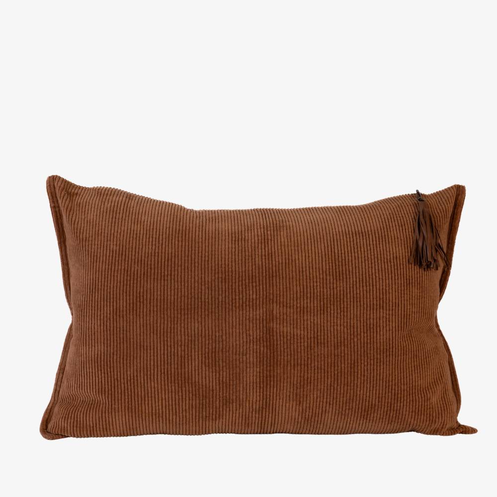 Brown ribbed pillow with tassels on a white background