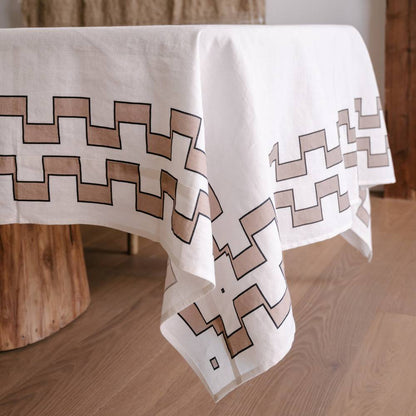 Tablecloth with geometric pattern on a wooden table