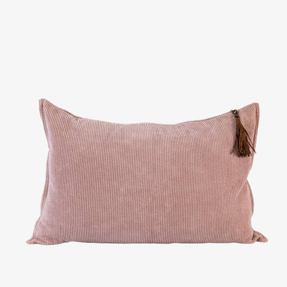 Pink striped pillow with a tassel on a white background