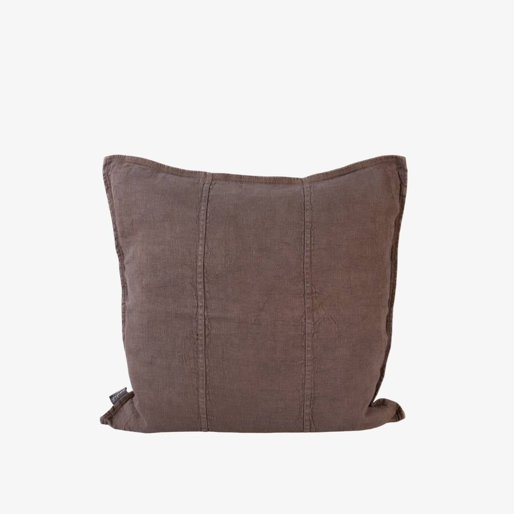 Brown pillow on a white background