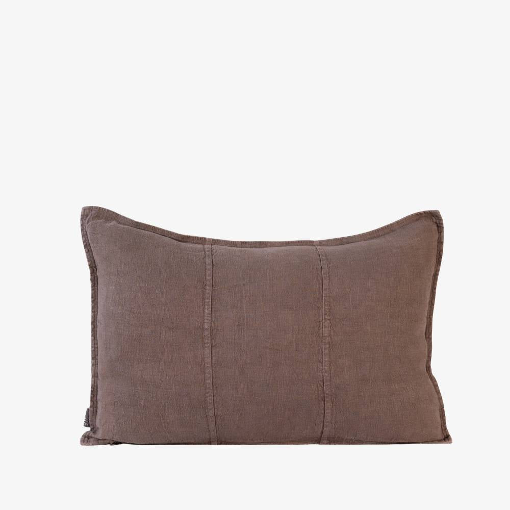 Brown pillow on a white background