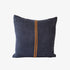 Dark blue pillow with an orange stripe on a white background