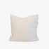White pillow with fringe detail