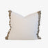 White pillow with beige ruffled edges 