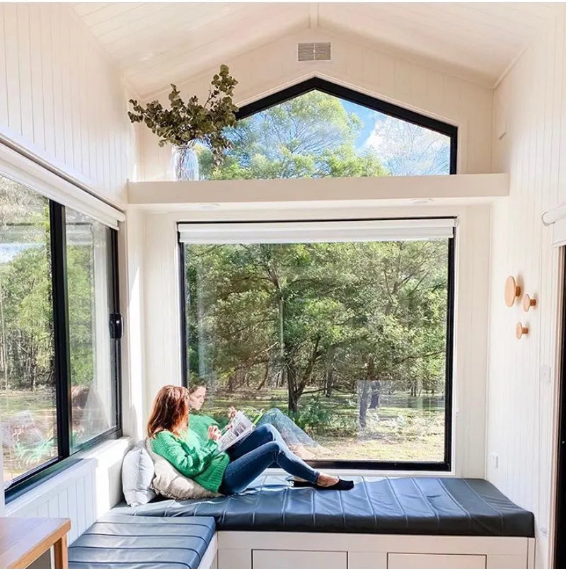 tiny house with big glass windows for light and reading space