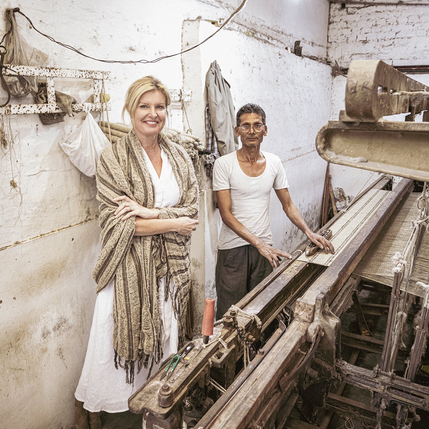 Indian artisans in ethical factories hand looming