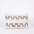 Decorative rectangular pillow with 2 lines of geometric pattern on a white background