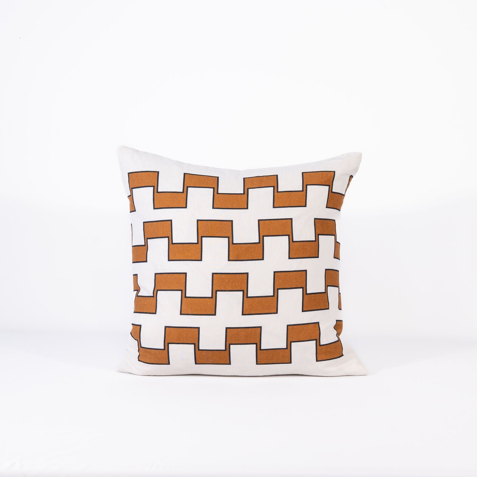 Decorative pillow with 4 lines of brown geometric pattern on a white background