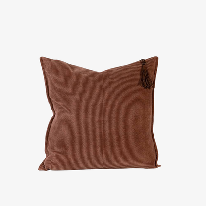Brown textured corduroy pillow with tassels 