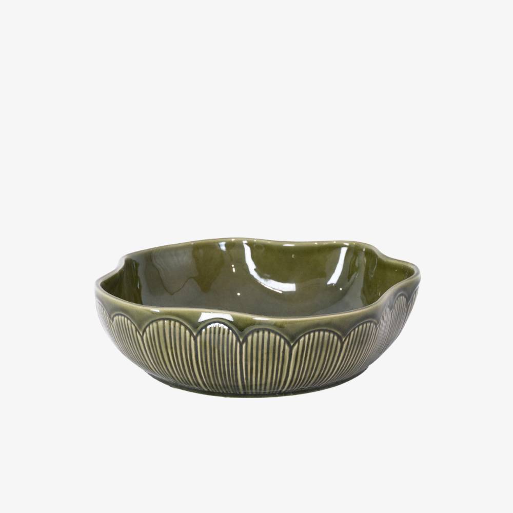 Green ceramic bowl with textured design on a white background
