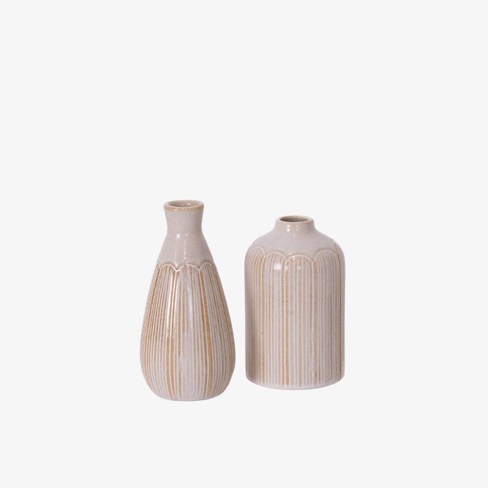 Two ceramic vases with striped design on a white background