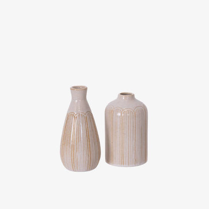 Two ceramic vases with striped design on a white background