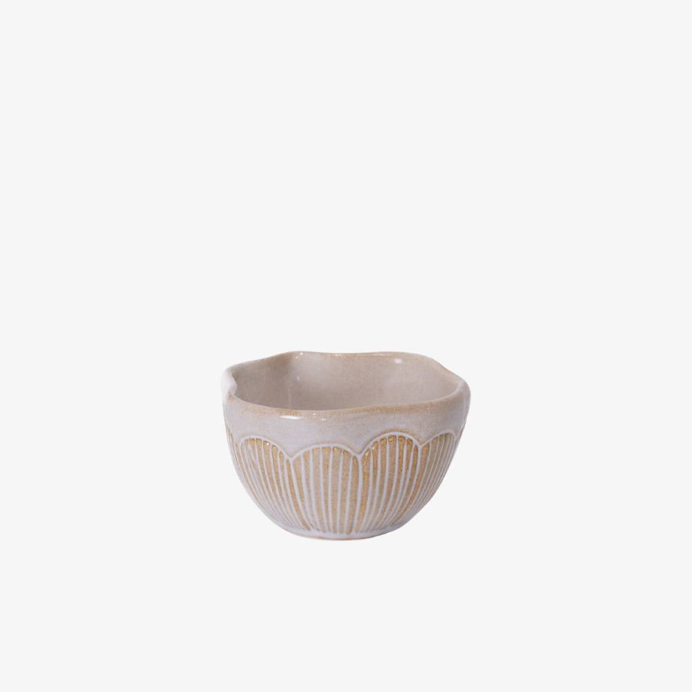 Ceramic bowl with decorative pattern on a white background