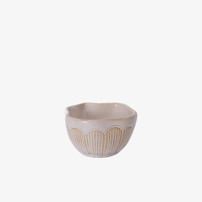 Ceramic bowl with decorative pattern on a white background
