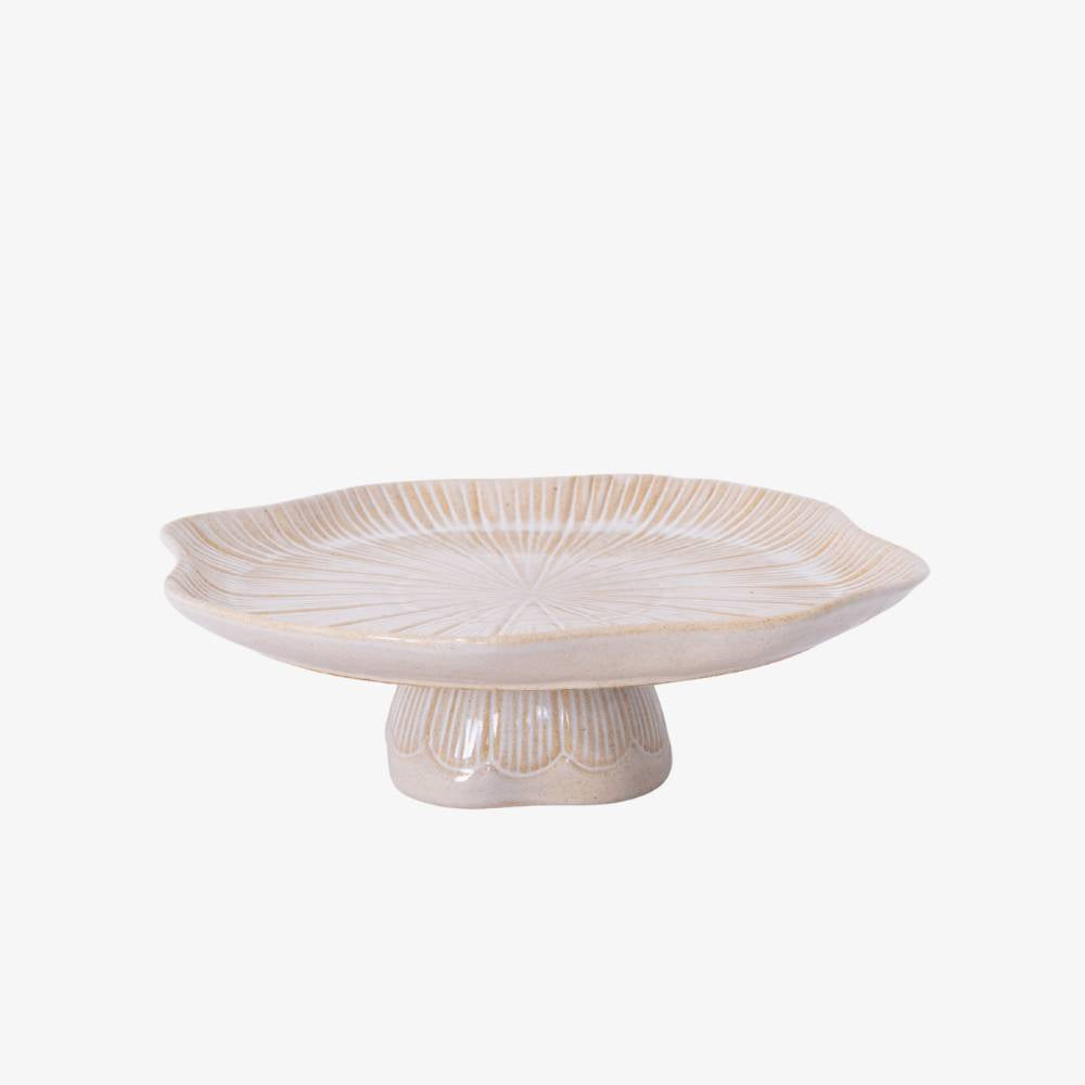 Decorative ceramic pedestal bowl on a white background