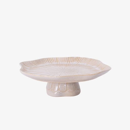 Decorative ceramic pedestal bowl on a white background