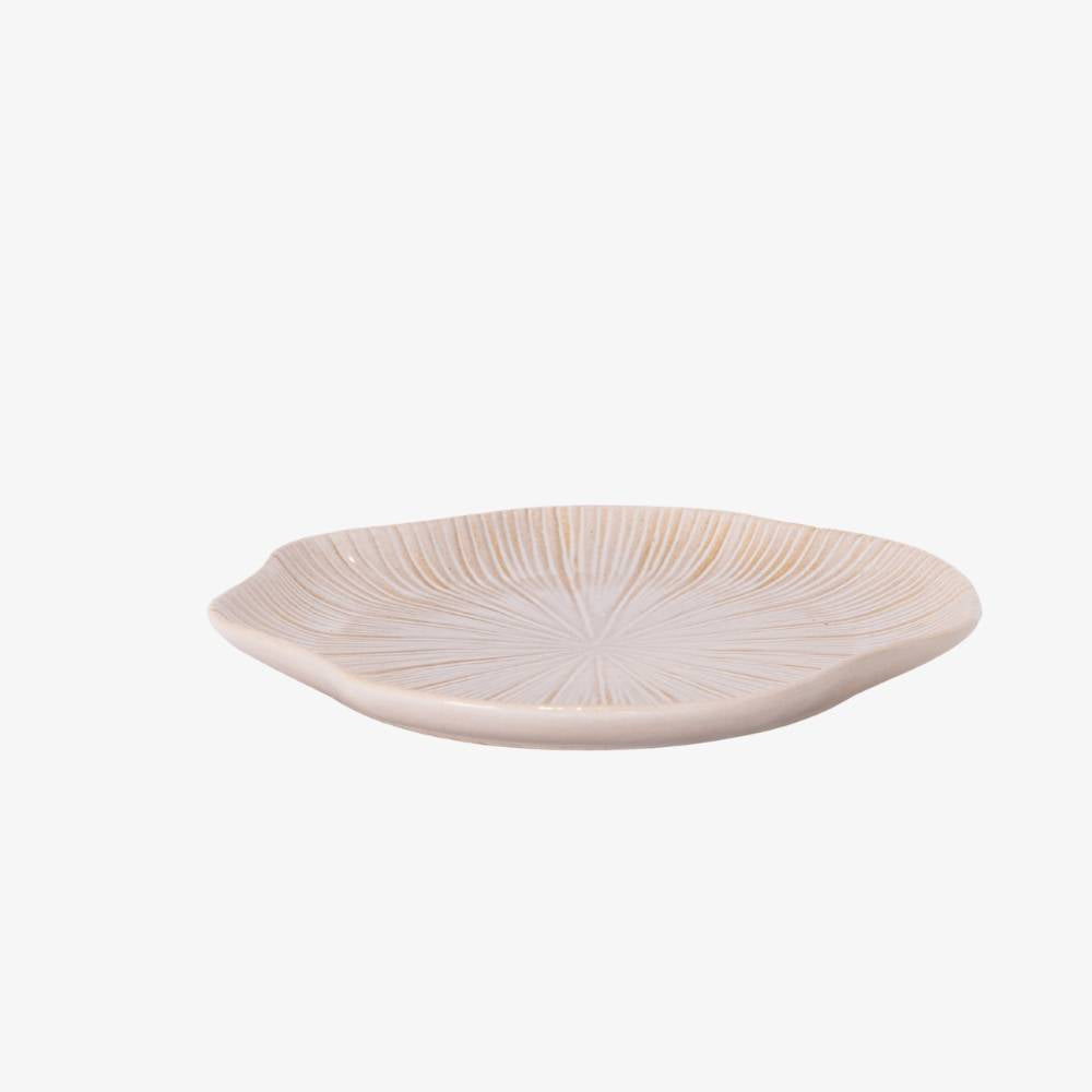 Decorative ceramic plate with a textured design on a white background