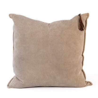 Beige cushion with tassel on a white background